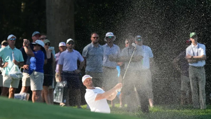 Clark leading BMW golf playoff